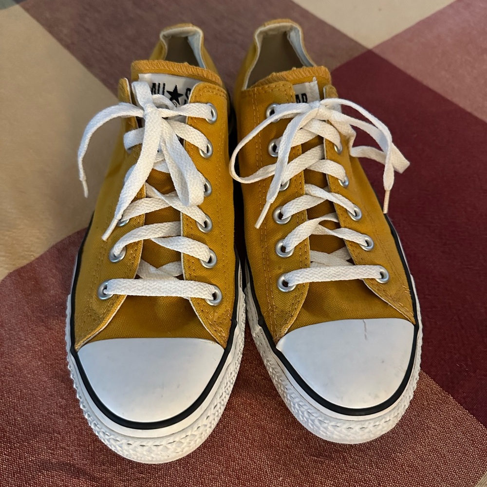 Yellow, low-top Converse. Size 8 Men’s, Size 10 Women’s. Unisex style.